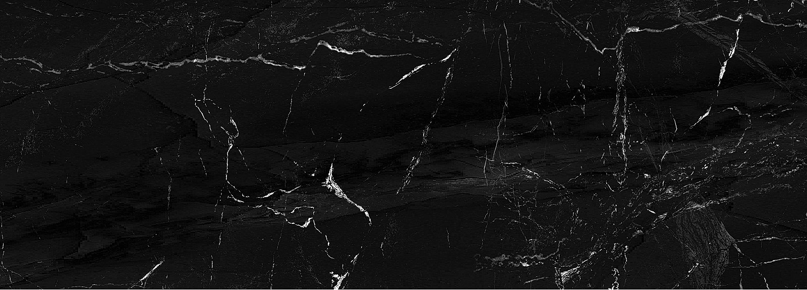 Black marble texture with white veining patterns.
